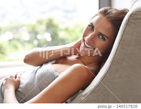 Portrait, woman and happy to relax in home, healthy and wellness by window view on lazy weekend. Young person, positive face and indoor for rest on cozy sofa and peace on vacation in modern apartment Portrait, woman and happy to relax in home, healthy and wellness by window view on lazy weekend. Young person, positive face and indoor for rest on cozy sofa and peace on vacation in modern apartment 140517810