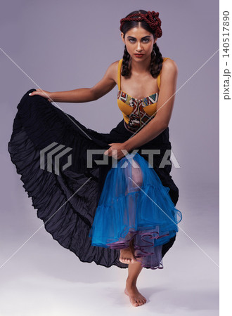 Portrait, flamenco or woman in dress to dance with energy, freedom or fashion for Spanish style. Creative, purple background or artist in studio, tango or performance in musical culture or tradition Portrait, flamenco or woman in dress to dance with energy, freedom or fashion for Spanish style. Creative, purple background or artist in studio, tango or performance in musical culture or tradition 140517890