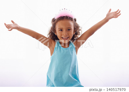 Little girl, excited and portrait on white background, princess crown and sweet for birthday and cute. Female child, kid and face for curly hair, happiness and joy for costume and playful in studio Little girl, excited and portrait on white background, princess crown and sweet for birthday and cute. Female child, kid and face for curly hair, happiness and joy for costume and playful in studio 140517970