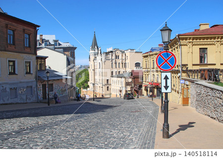 Andriyivskyy Descent in Kyiv with cobblestone street and Richard Lionheart Castle Andriyivskyy Descent in Kyiv with cobblestone street and Richard Lionheart Castle 140518114