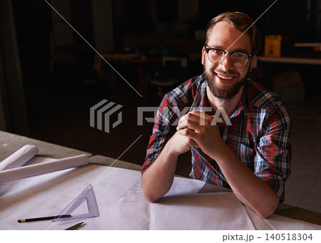 Portrait, confident and architect with paperwork in workshop with smile for career in construction industry. Man, contractor and entrepreneur of startup, small business and design for planning Portrait, confident and architect with paperwork in workshop with smile for career in construction industry. Man, contractor and entrepreneur of startup, small business and design for planning 140518304