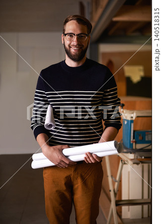 Portrait, smile and man with blueprint, architect and real estate development with ideas and glasses. Person, employee and engineering with documents or maintenance with renovation, smile or property Portrait, smile and man with blueprint, architect and real estate development with ideas and glasses. Person, employee and engineering with documents or maintenance with renovation, smile or property 140518315