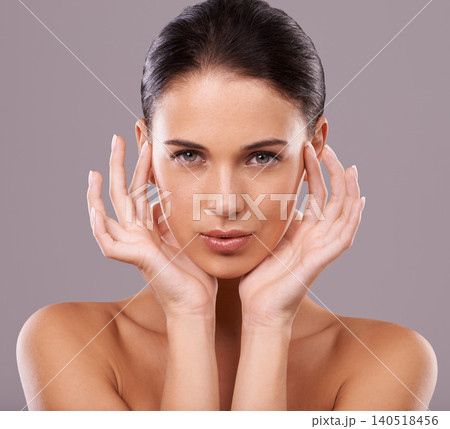 Portrait, shine and woman with skincare, wellness and dermatology on grey studio background. Face, person and model with glow or foundation with beauty or cosmetics with facial, grooming or aesthetic Portrait, shine and woman with skincare, wellness and dermatology on grey studio background. Face, person and model with glow or foundation with beauty or cosmetics with facial, grooming or aesthetic 140518456