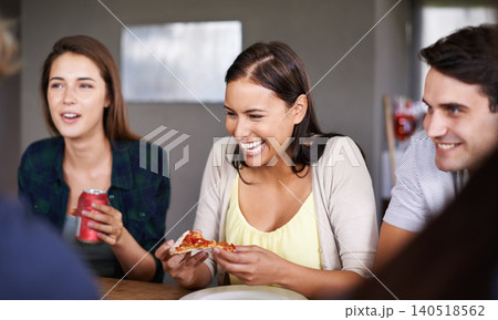 Pizza, funny and social gathering with group of friends eating together in restaurant for bonding. Smile, happy or laughing with young men and women enjoying fast food for hunger or conversation Pizza, funny and social gathering with group of friends eating together in restaurant for bonding. Smile, happy or laughing with young men and women enjoying fast food for hunger or conversation 140518562