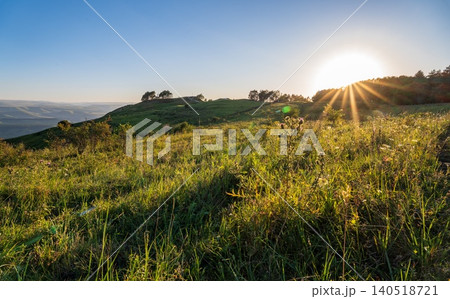 View of the mountains and Kislovodsk from the observation decks of the Kislovodsk Park. Evening sunset over the mountains of Kislovodsk. 140518721