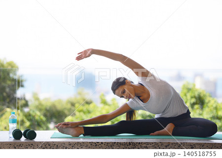 Woman, yoga and stretching body with mat by window for workout, exercise or outdoor training at home. Young female person or yogi with smile in relax or pilates for zen, fitness or warm up at house 140518755