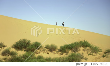 Modest Team Of Researchers Carefully Explores Sand Formations And Environmental Conditions Far Away. Creative Modest Team Of Researchers Carefully Explores Sand Formations And Environmental Conditions Far Away. Creative 140519098