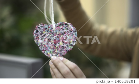 Artistic Depiction Of Ecofriendly Heart Design Placed On Indistinct Textured Surface As Background. Media Artistic Depiction Of Ecofriendly Heart Design Placed On Indistinct Textured Surface As Background. Media 140519201