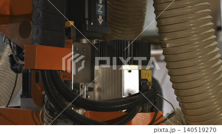 Detailed Machinery Setup, Focused Image Of Spindle Components With Cables And Vacuum Tubing Attached . Media Detailed Machinery Setup, Focused Image Of Spindle Components With Cables And Vacuum Tubing Attached . Media 140519270