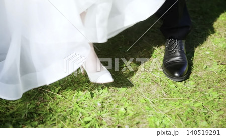 Romantic Outdoor Scene With Fluttering Tulle. Creative. Sunlit Outdoor Wedding With Dancing Tulle And Joyful Atmosphere Romantic Outdoor Scene With Fluttering Tulle. Creative. Sunlit Outdoor Wedding With Dancing Tulle And Joyful Atmosphere 140519291