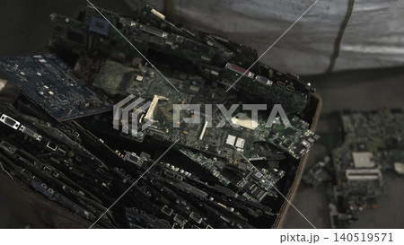 Collection Of Broken Electronic Boards With Exposed Gold Traces In Recycling Facility Setting . Media Collection Of Broken Electronic Boards With Exposed Gold Traces In Recycling Facility Setting . Media 140519571