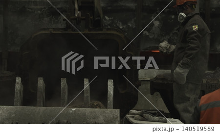 Technician Checks Heated Vessel Thoroughly. Safety Expert Inspects Hot Tank And Tools Carefully . Stock clip Technician Checks Heated Vessel Thoroughly. Safety Expert Inspects Hot Tank And Tools Carefully . Stock clip 140519589