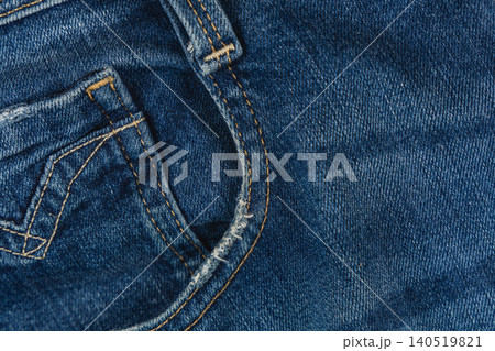 Closeup view of denim jeans showing pocket and stitching details Closeup view of denim jeans showing pocket and stitching details 140519821