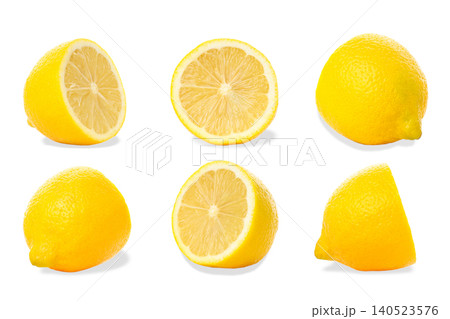 Lemons cut and ready for drinks and dishes, on white Lemons cut and ready for drinks and dishes, on white 140523576