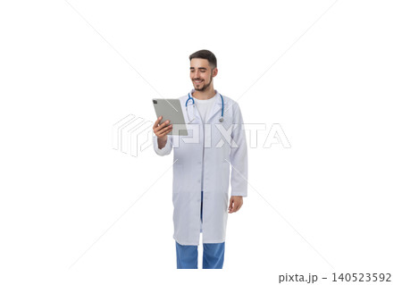 Doctor reviews patient info on tablet, on white Doctor reviews patient info on tablet, on white 140523592