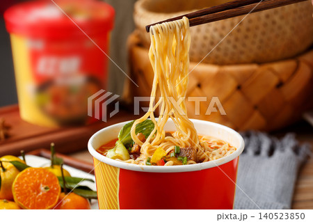 Close-up of Braised Beef Cup Noodles with Chopsticks Close-up of Braised Beef Cup Noodles with Chopsticks 140523850