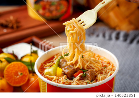 Close-up of Braised Beef Cup Noodles with Chopsticks Close-up of Braised Beef Cup Noodles with Chopsticks 140523851