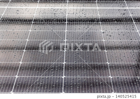 Photovoltaic panel after rain in cloudy day. Photovoltaic panel after rain in cloudy day. 140525415