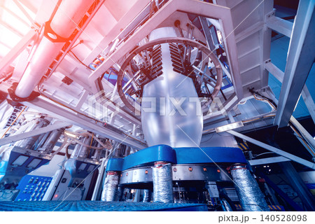 Modern automated production line in factory. Plastic bag manufacturing process Modern automated production line in factory. Plastic bag manufacturing process 140528098