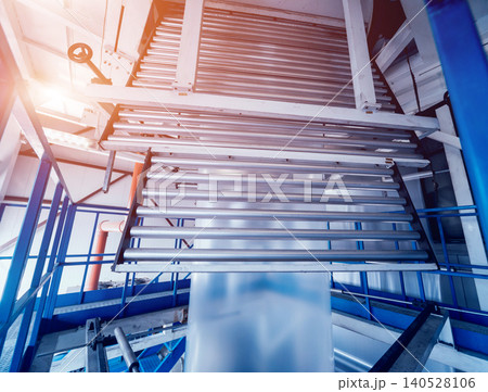 Modern automated production line in factory. Plastic bag manufacturing process Modern automated production line in factory. Plastic bag manufacturing process 140528106