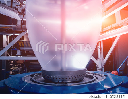 Modern automated production line in factory. Plastic bag manufacturing process Modern automated production line in factory. Plastic bag manufacturing process 140528115