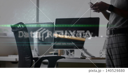 Checking smartphone, man in short-sleeve top at office, monitors, Data Recovery overlay, copy space 140529880
