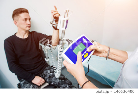 Patient on CPM (continuous passive range of motion) machines. Patient on CPM (continuous passive range of motion) machines. 140530400