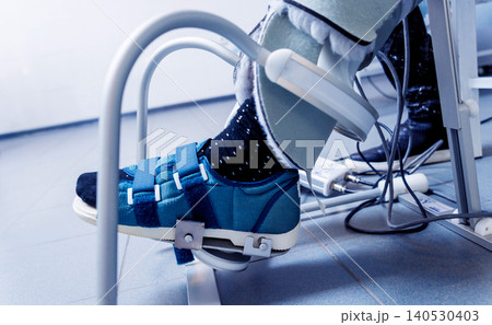 Patient on CPM (continuous passive range of motion) machines. Device to provide anatomically correct motion to both the ankle and subtalar joints. Patient on CPM (continuous passive range of motion) machines. Device to provide anatomically correct motion to both the ankle and subtalar joints. 140530403