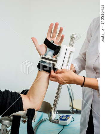 Patient on CPM (continuous passive range of motion) machines. Patient on CPM (continuous passive range of motion) machines. 140530413