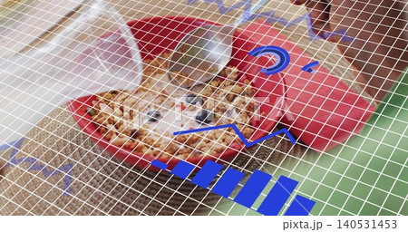 Peeking brown-white hamster resting in red dish on beige pad, white-grid-blue-graphics overlaying Peeking brown-white hamster resting in red dish on beige pad, white-grid-blue-graphics overlaying 140531453