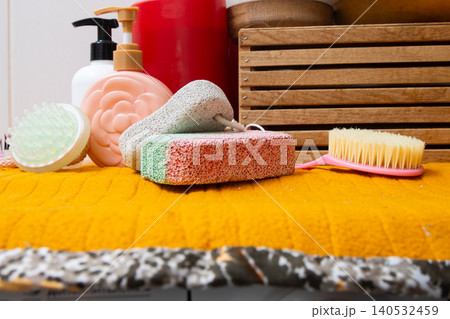 Bathroom Accessories for Foot Care. Pumice stone and brush for heels legs 140532459