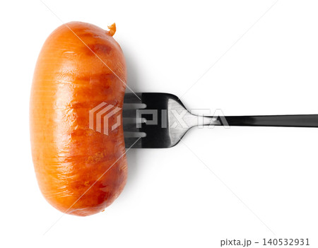 Appetizing sausage on a fork, isolated on white background Appetizing sausage on a fork, isolated on white background 140532931
