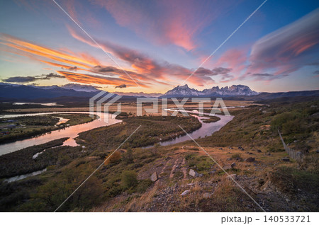 Patagonia river valley sunset, mountain peak, colorful sky 140533721