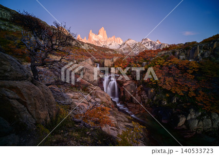 Patagonia mountain waterfall at dawn in autumn valley Patagonia mountain waterfall at dawn in autumn valley 140533723