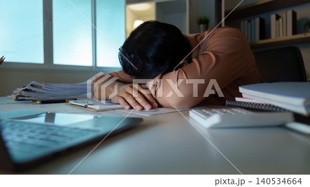 Asian man suffering from burnout, exhausted from overwork at home office Asian man suffering from burnout, exhausted from overwork at home office 140534664