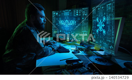 Engineer working with multiple holographic drone interfaces military command system. Engineer working with multiple holographic drone interfaces military command system. 140534729