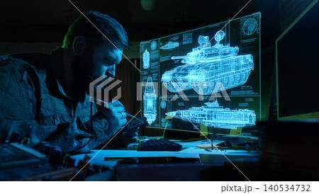 Military engineer designing armored vehicle and missile system hologram. Military engineer designing armored vehicle and missile system hologram. 140534732