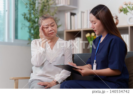 Nurse consulting elderly woman about health concerns Nurse consulting elderly woman about health concerns 140534742
