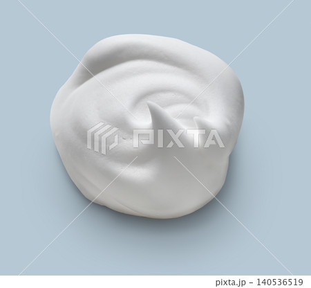 Foamy skin care product isolated on a blue background. Foamy skin care product isolated on a blue background. 140536519