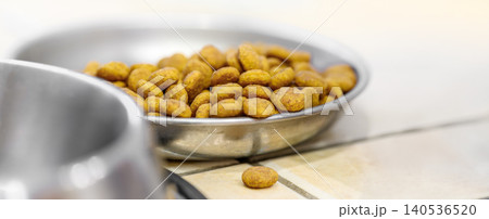 Closeup pet food in stainless bowl Closeup pet food in stainless bowl 140536520