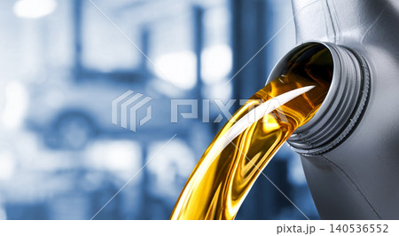 Pouring motor oil into the car engine Pouring motor oil into the car engine 140536552