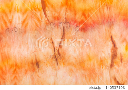 abstract pattern on silk fabric texture in yellow and brown tones 140537108
