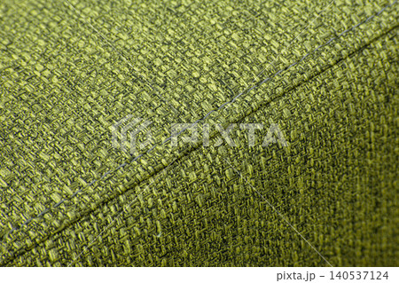 Textured green furniture fabric with stitching 140537124