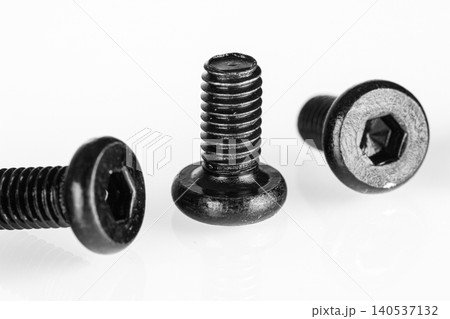 hex socket head screw in black color on isolated white background hex socket head screw in black color on isolated white background 140537132