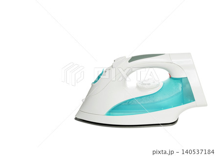 horizontal cordless iron of turquoise color on the right side on white background 140537184
