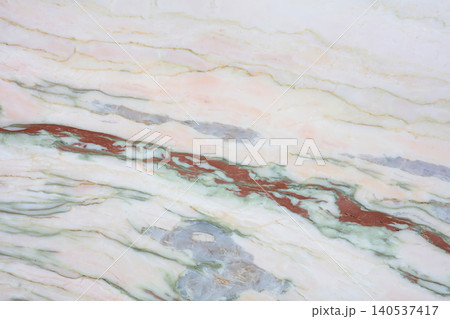 Colorful stone surface with different patterns and hues in a natural setting Colorful stone surface with different patterns and hues in a natural setting 140537417