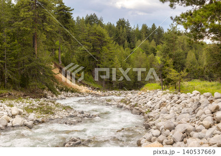 mountain river along ski road in Bansko, Bulgaria mountain river along ski road in Bansko, Bulgaria 140537669