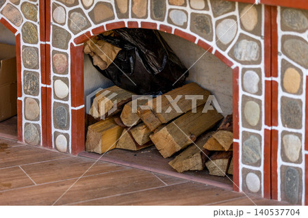 close-up stacked firewood for a barbecue close-up stacked firewood for a barbecue 140537704