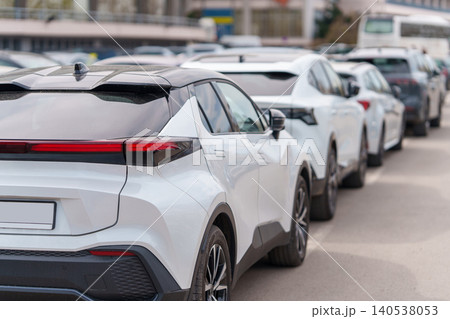 Cars in a row. A lot of parked vehicles Cars in a row. A lot of parked vehicles 140538053