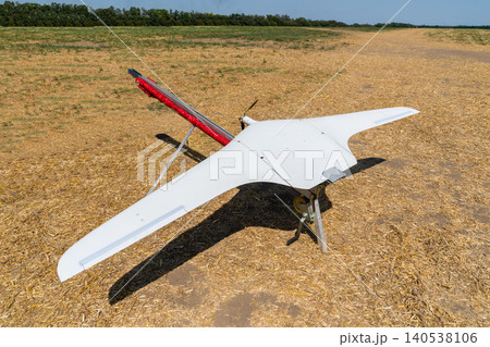 Surveillance drone ready for take-off from catapult launcher Surveillance drone ready for take-off from catapult launcher 140538106